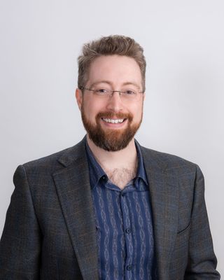 Portrait of Ken Wilton, Associate.